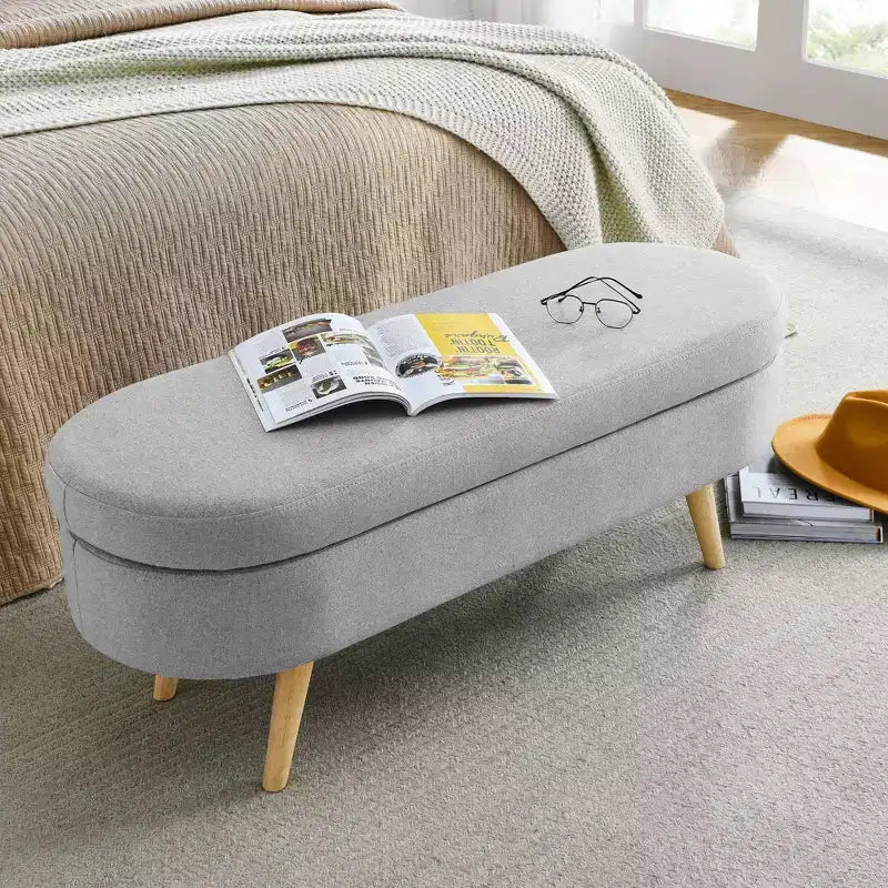 Panca contenitore ovale moderna in lino con gambe in legno di gomma