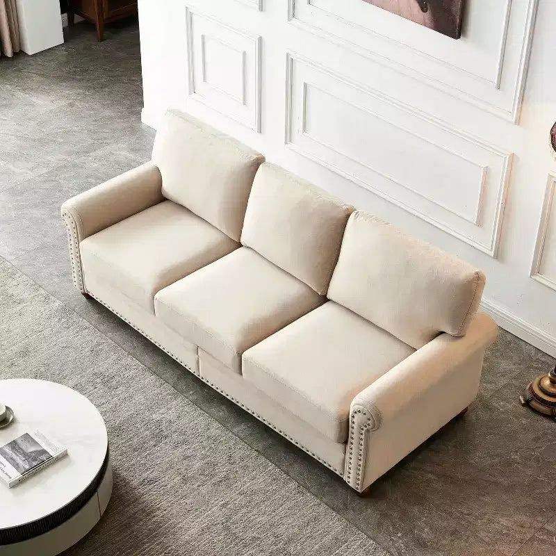 Divano con struttura in metallo e legno massello, decorazione con borchie argentate