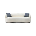 Beżowa, zaokrąglona sofa w stylu mid-century modern