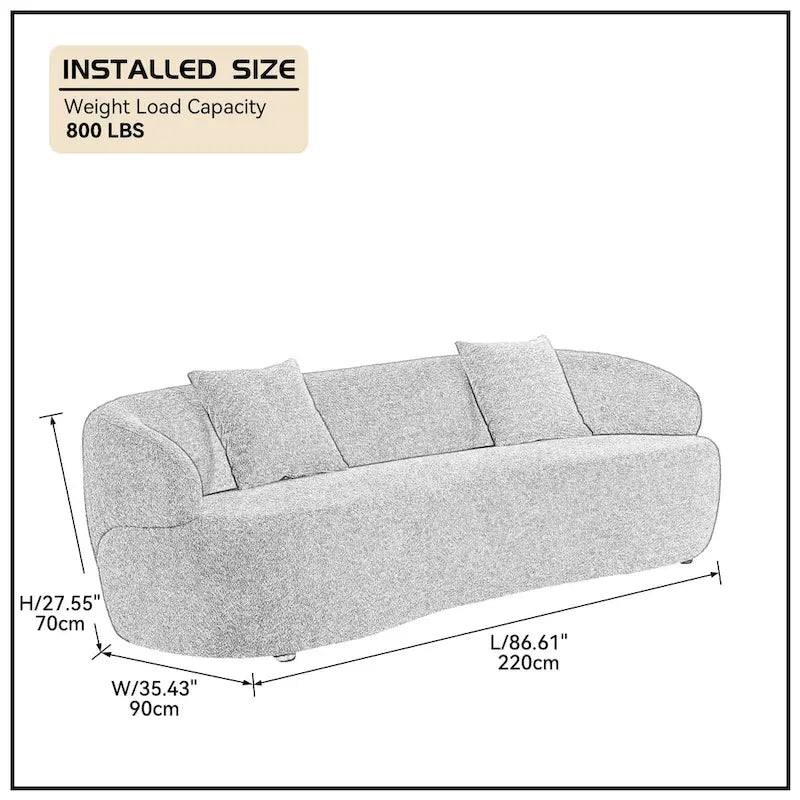 Beżowa, zaokrąglona sofa w stylu mid-century modern